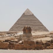 a pyramid with people standing around