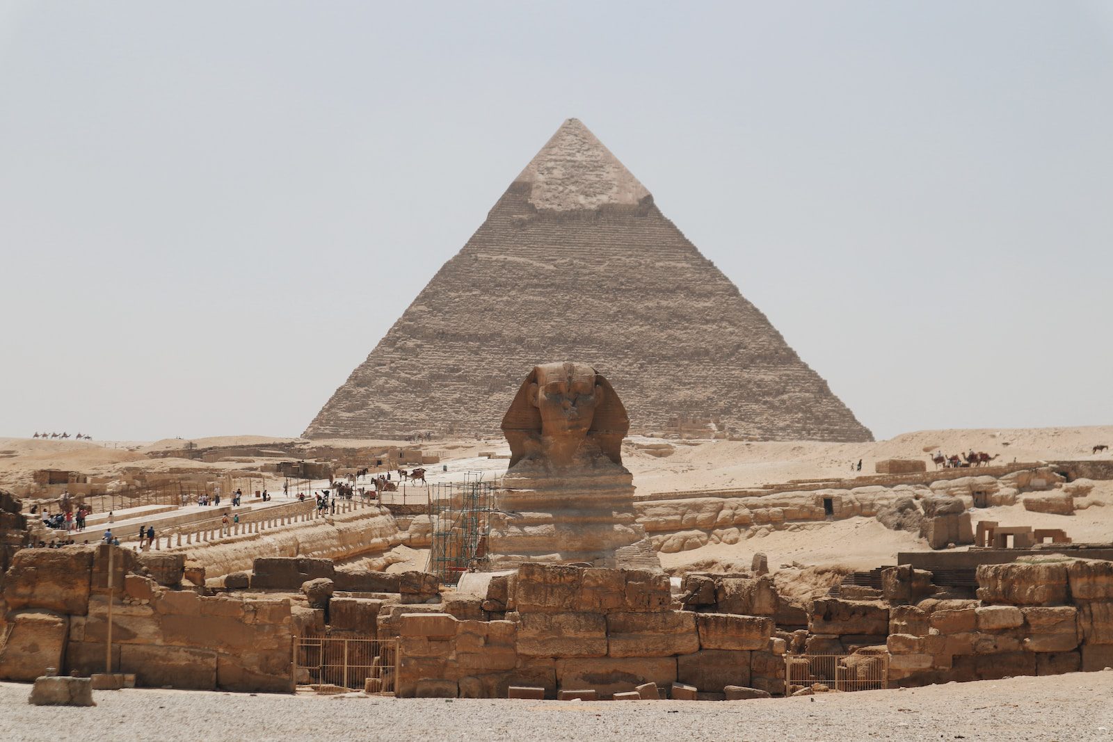 a pyramid with people standing around